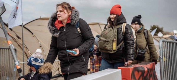 Ukrainian refugees arrive at the Medyka border point in Poland