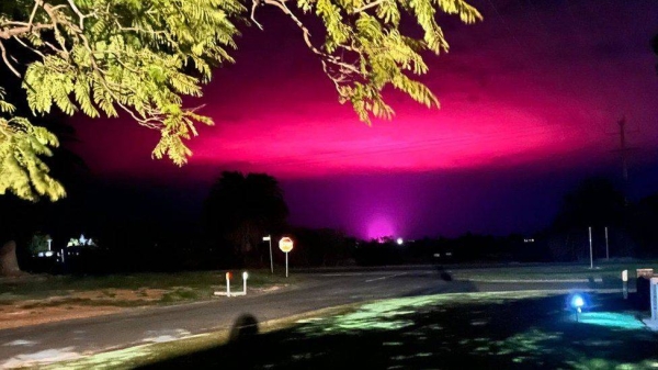 Locals in the town of Mildura were confused by a pink glow in the sky.