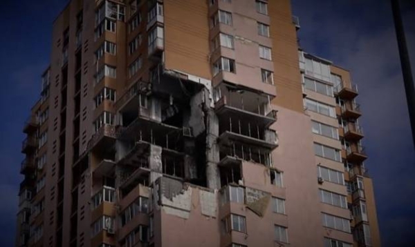 A Kyiv apartment block damaged by a Russian rocket