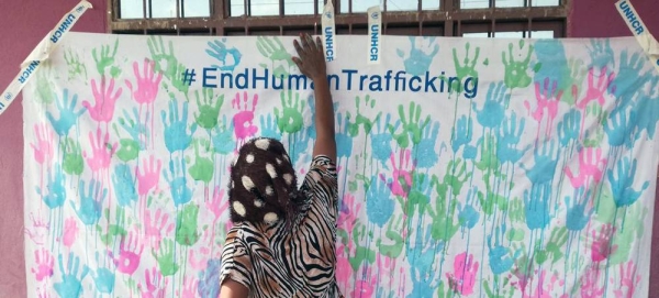 A refugee whose family were impacted by human trafficking shows her support for UNHCR’s anti-trafficking campaign in eastern Sudan. — courtesy UNHCR/Osama Idriss