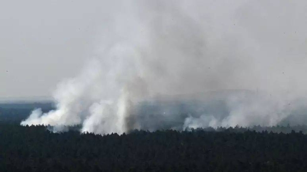 A large fire broke out in Berlin's popular Grunewald forest following an explosion in a police munitions storage site on Thursday.