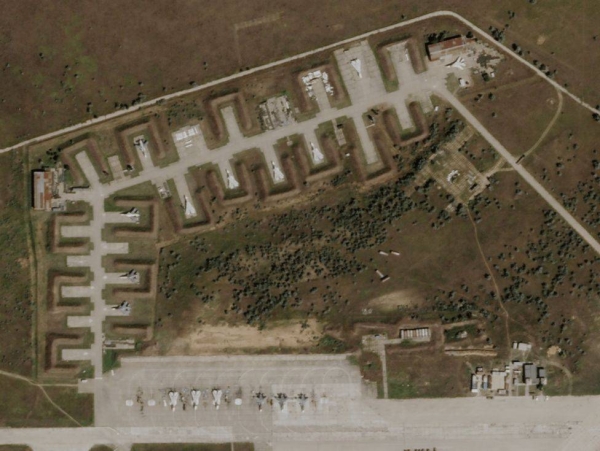 The Saky airbase on 10 August - after the explosions. Several damaged warplanes are visible.