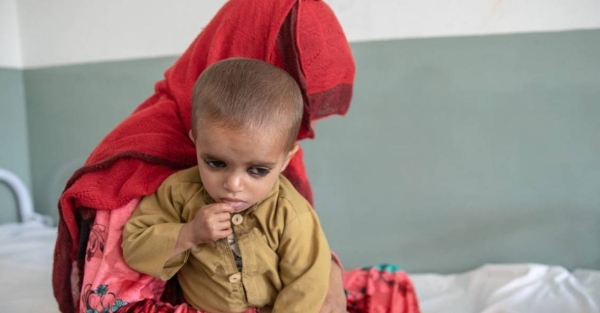 A mother and her two-year-old son are treated for malnutrition at a hospital in Kunar Province, Afghanistan.