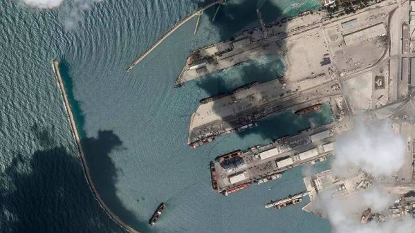 Satellite image from Planet Labs PBC shows the Sierra Leone-flagged cargo ship Razoni, at port in Tartus, Syria Monday.