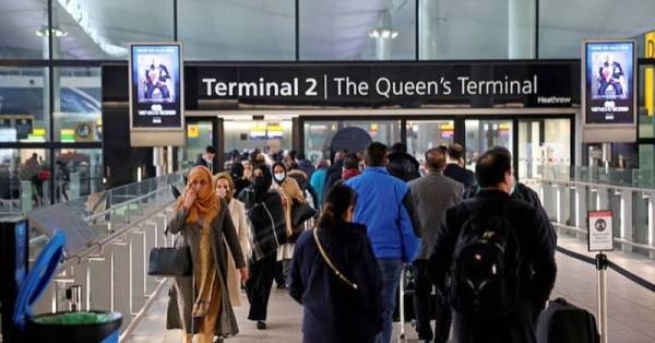 Travelers at Heathrow airport, in London.