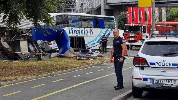 In this photo provided by the Bulgarian News Agency, a police man stands near the scene of an incident, in the Black Sea city of Burgas, Bulgaria, Thursday.