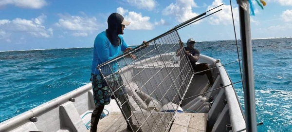 Biologists Maria Fernanda Maya and Mariana Gnecco from NGO Blue Indigo evaluate the health of the coral reef in San Andrés Island. — courtesy Blue Indigo