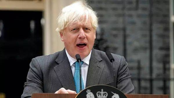 Outgoing British Prime Minister Boris Johnson speaks outside Downing Street in London, Tuesday