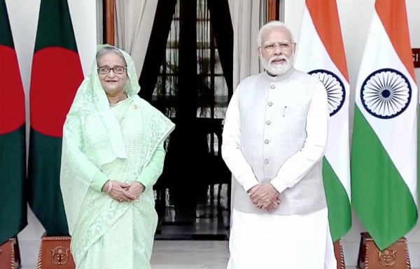 Indian Prime Minister Narendra Modi and Bangladesh Prime Minister Sheikh Hasina address a joint press conference in New Delhi on Tuesday.