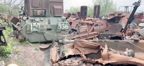 A Ukrainian soldier advances toward the Russian border in the Kharkiv region, Ukraine.