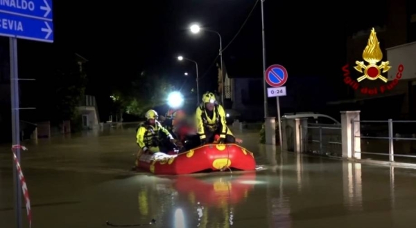 Footage released by fire brigades showed rescuers on rafts trying to evacuate people in the seaside town of Senigallia.