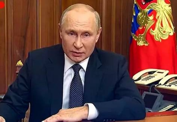 Russian President Vladimir Putin addresses the nation in Moscow, Russia, Wednesday.