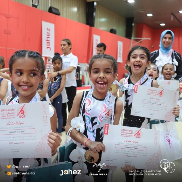 Winners with officials of the Saudi Gymnastics Federation, which concluded on Saturday the second session of the Kingdom’s Championship for Girls’ Clubs and Bodies.