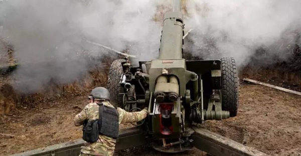 Ukrainian soldiers fire, on the front line in the Kharkiv region, Ukraine, Wednesday.