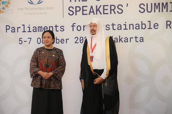 Indonesian President Joko Widodo receiving Saudi Shoura Council President Sheikh Abdullah Al-Sheikh during the inaugural session of the 8th G20 Parliamentary Speakers’ Summit, which began in Jakarta on Thursday. 