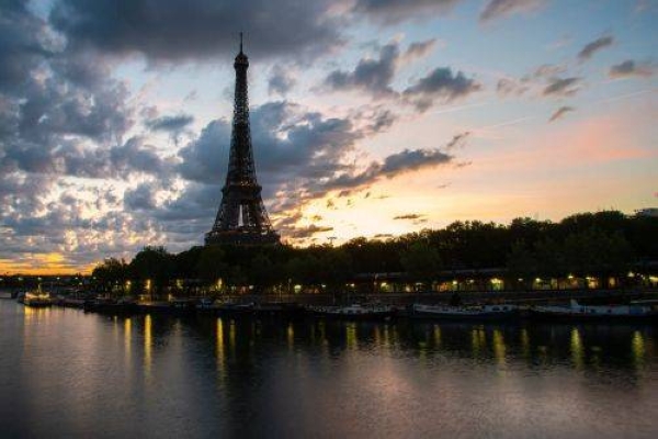 The Eiffel Tower will have its lights turned off more than an hour earlier each night