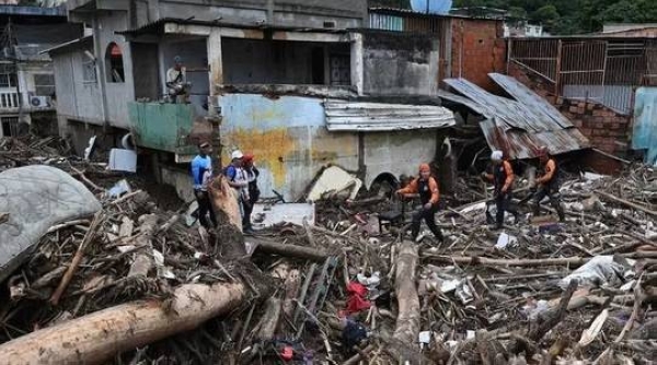 Rescue efforts continue in Las Tejerias, as torrential rain has caused deadly landslides
