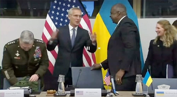 NATO Secretary-General Jens Stoltenberg speaks to US Defense Secretary Lloyd Austin at the NATO headquarters in Brussels, Belgium.