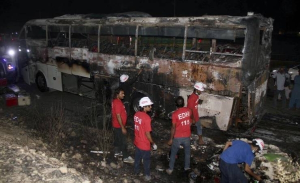 Pakistan bus fire kills at least 18 flood survivors