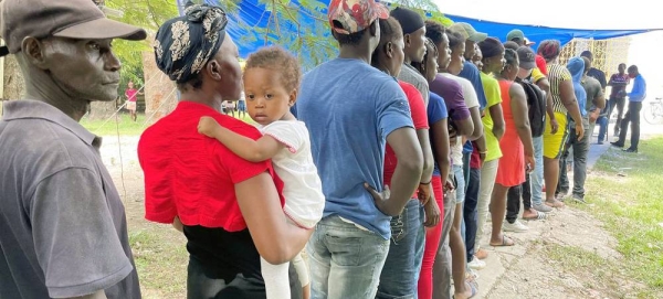 Mothers wait with their children to be vaccinated at a UNFPA-supported hospital in southern Haiti. — courtesy UNFPA/Ralph Tedy Erol
