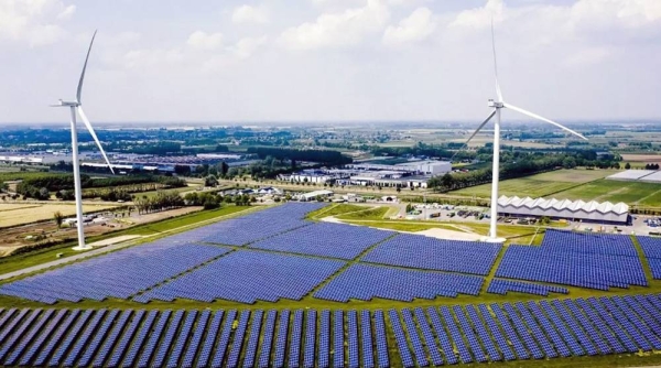 This aerial view shows the Avri solar park along the highway 'A15' in Geldermalsen. With 34,000 solar panels, the park is the largest in Gelderland, Netherlands. — courtesy SEM VAN DER WAL / ANP / AFP