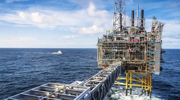 The Sleipner A gas platform, Norway, as a Coast Guard ship patrols around the platform. — courtesy Ole Berg-Rusten/NTB Scanpix