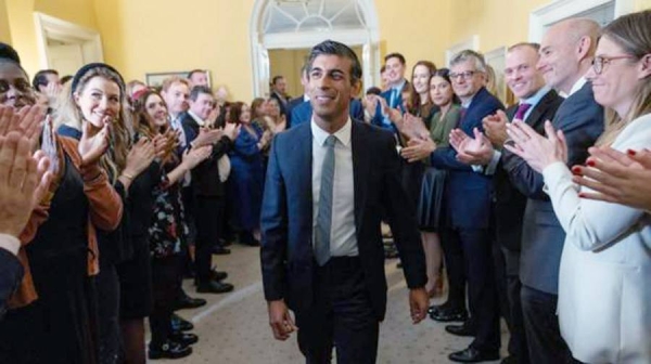 Britain’s new Prime Minister Rishi Sunak, seen entering 10 Downing Street for the first time Tuesday, announced his Cabinet with Jeremy Hunt remaining Chancellor.