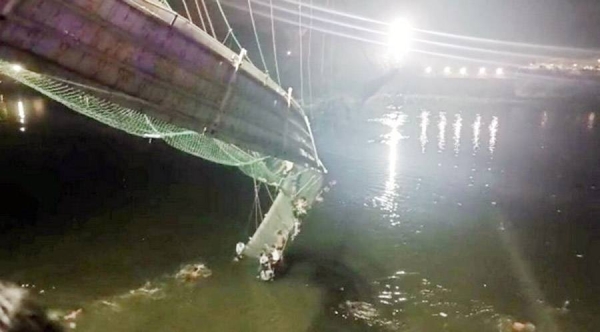 Hundreds were plunged into the river as the bridge gave way. — courtesy photo