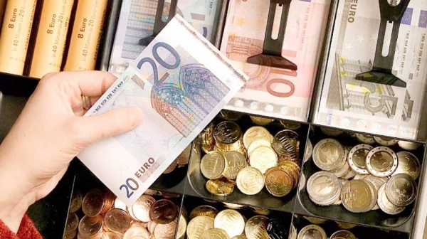 Euro coins and banknotes are pictured in a shop in Duisburg, Germany, Dec. 29, 2001. — courtesy photo