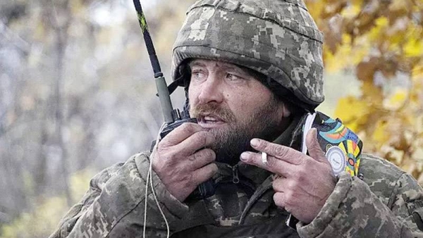 A Ukrainian officer gives commands during the battle in the front line near Bakhmut.