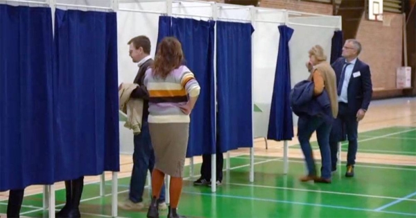 People vote in Copenhagen Monday in Denmark elections.