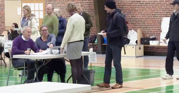 People vote in Copenhagen Monday in Denmark elections.