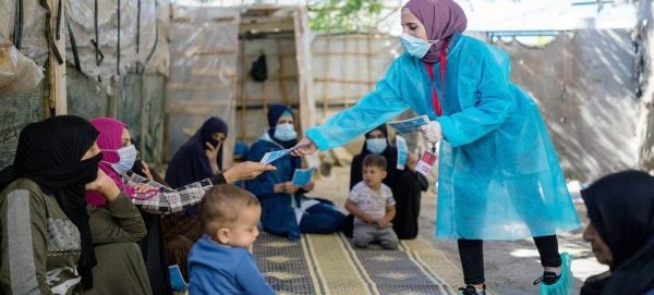 UNICEF staff conduct hygiene awareness sessions to communities in Lebanon to help stop the transmission of cholera. — courtesy UNICEF/Fouad Choufany