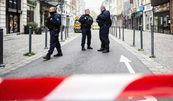 French police blocks access to the site of a collapsed building in the city of Lille, northern France, on November 12, 2022. — courtesy Sameer Al-Doumy/AFP