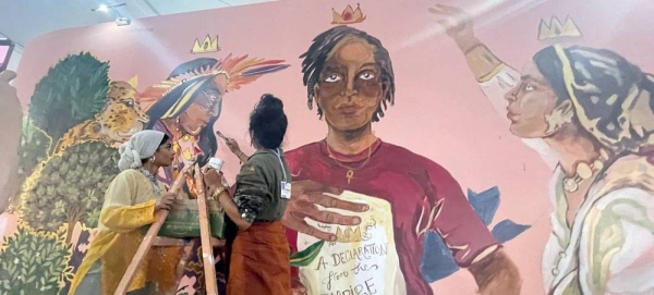 Mural hand painted by the Fearless Collective at the COP27 Youth Pavilion, which creates public art interventions with women. — courtesy UN News/Laura Quiñones