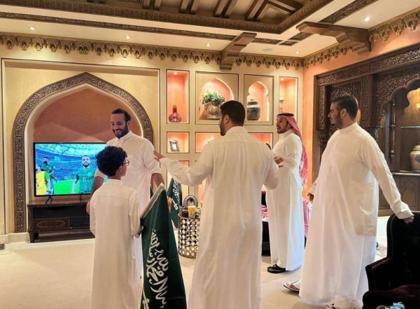 Prince Mohammed bin Salman embracing those present after the Green Falcons’ stunning victory that shattered a 36-game winning streak for the Argentinian team.