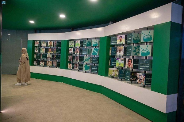 The Saudi team's World Cup and Asian Cup jerseys are displayed at the Green Falcons' Museum at Saudi Arabia House.