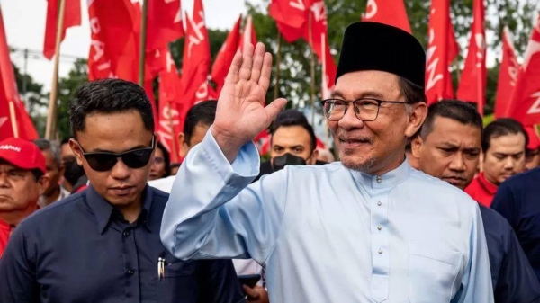 Anwar Ibrahim has been appointed to the job after days of uncertainty