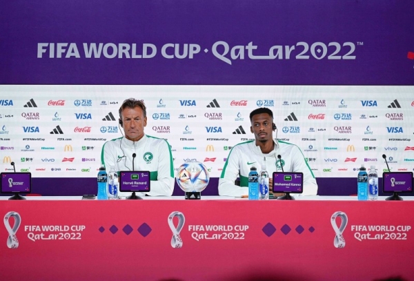 Flanked by Saudi player Muhammad Kanno, Head Coach Hervé  Renard addressing a press conference in Doha on Tuesday to brief on tomorrow’s match against Mexico. 

