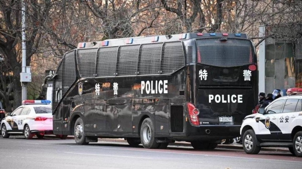 A heavy police presence was seen in Beijing and Shanghai on Tuesday