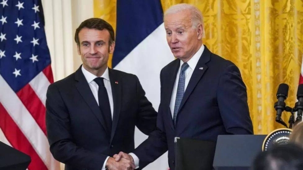 President Biden strongly caveated his remarks about potential talks with Russia's leader while standing beside the French president,