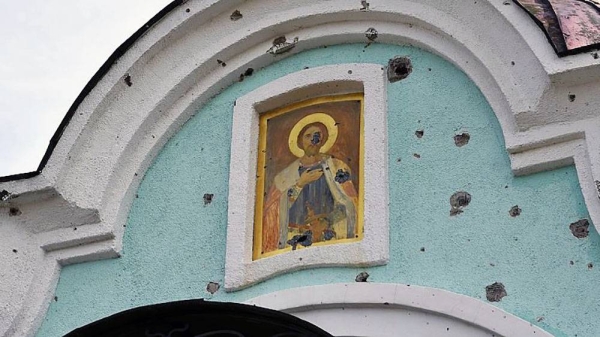 An Orthodox icon is seen on a damaged church in the retaken village of Bohorodychne, eastern Ukraine. — courtesy photo