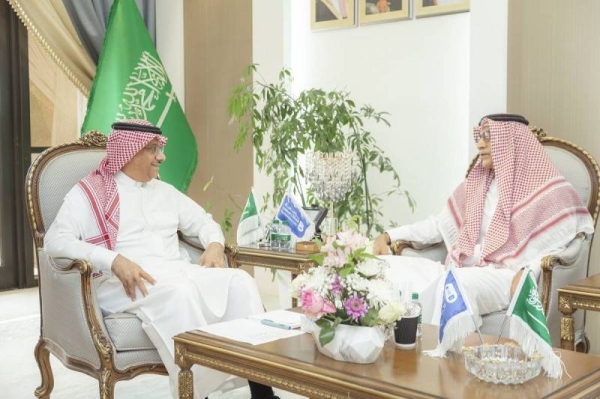 Dr. Badran Al-Omar, president of King Saud University, and Abdullah Saleh Kamel, chairman of the Board of Trustees of the Saleh Abdullah Kamel Humanitarian Foundation meet in Riyadh on Wednesday. 