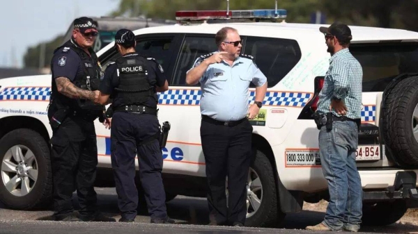 Police work near the scene in Wieambilla, Queensland, Australia, on Monday