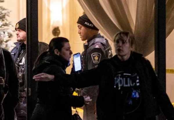 Police evacuate residents from the scene of mass shooting in Canada.