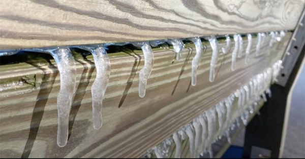 A holiday shopper in Toronto braves the an Arctic blast that gripped much of the United States and Canada on Saturday.