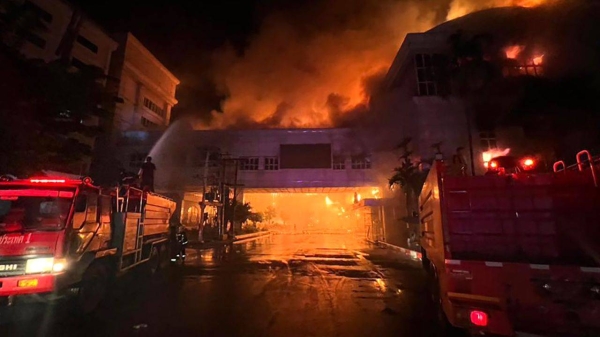 Fire engulfs the Grand Diamond City Hotel and Casino in Poipet, Cambodia on December 28, 2022