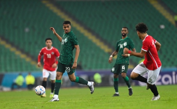 The Saudi national team players celebrate after  a 2-0 victory over Yemen, in the first round of the group stage of the 25th Arabian Gulf Cup 2023 match at Basra International Stadium, in Basra.