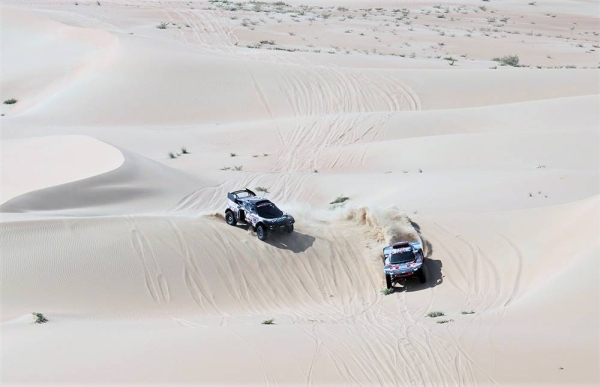 Leaving the rest being on another Dakar stage - Sebastien Loeb and Fabian Lurquin in their Bahrain Raid Xtreme Prodrive Hunter.