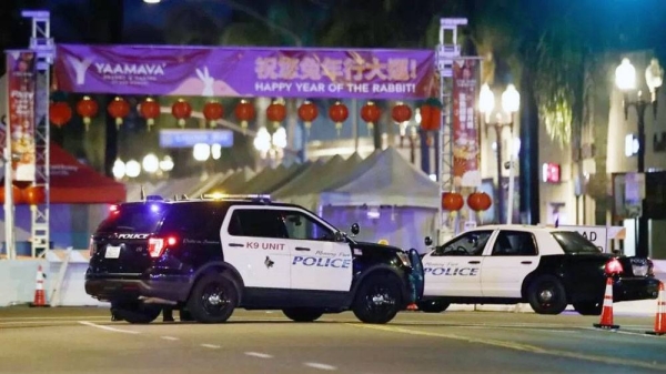 Police gather after the Monterey Park shooting. — courtesy EPA